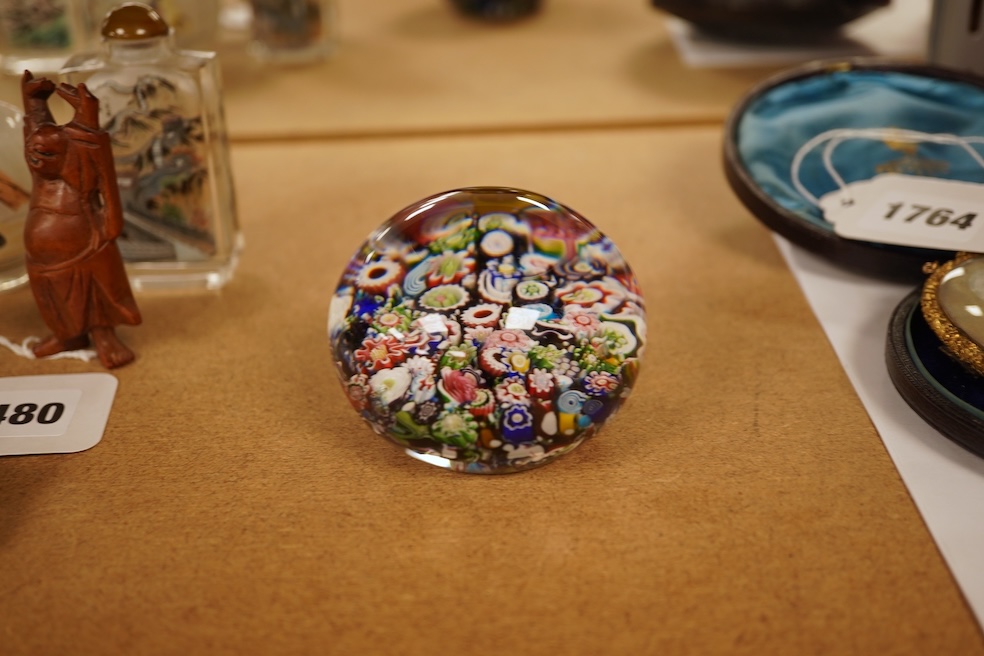 A Clichy millefiori paperweight, 7cm in diameter